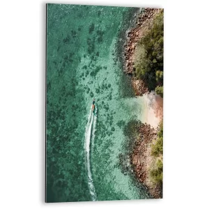 Boot langs kristalheldere kust